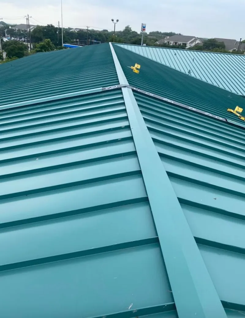 Green commercial metal roof ridge and valley for Metal Roof Repair in Burkburnett