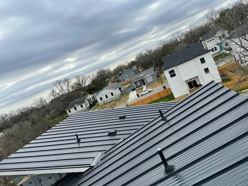 Standing seam metal roof panels with vents for Skylight Repair in Burkburnett